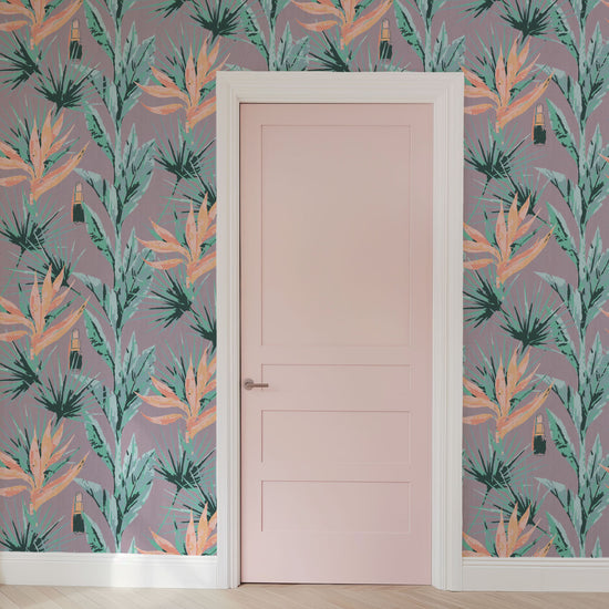 light purple based allover floral print with light pink and orange birds of paradise floral paired with shades of green palm leaves with added light pink lipstick tubes scattered throughout the print Grasscloth Natural Textured Eco-Friendly Non-toxic High-quality  Sustainable practices Sustainability Interior Design Wall covering bold vertical stripe botanical flowers garden tropical jungle beauty salon medspa makeup paper weave paperweave