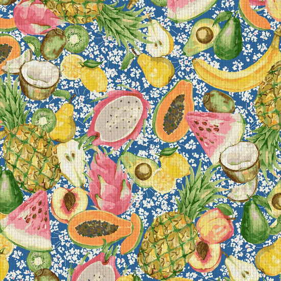 paper weave wallpaper hand painted with watercolors, blue based print with white ditsy florals with tossed fruit layered on top including: pineapples, limes, bananas, avocados, lemons, pears, peaches, watermelon, coconuts, mangos, bananas passion fruit Natural Textured Eco-Friendly Non-toxic High-quality Sustainable practices Sustainability Interior Design Wall covering Bold tropical retro chic garden