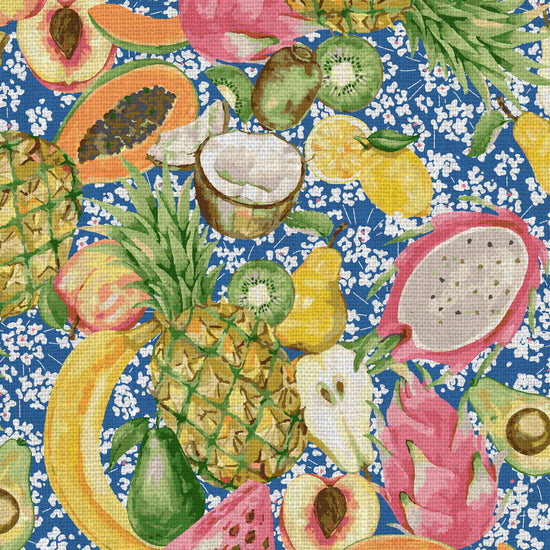 hand painted with watercolors, blue based print with white ditsy florals with tossed fruit layered on top including: pineapples, limes, bananas, avocados, lemons, pears, peaches, watermelon, coconuts, mangos, bananas passion fruit Natural Textured Eco-Friendly Non-toxic High-quality Sustainable practices Sustainability Interior Design Wall covering Bold tropical retro chic garden fabric upholstery