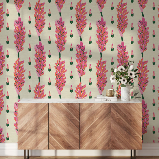 cream based grasscloth wallpaper print with vertical stripe pink and orange floral stripes next to lines of pink lipstick tubes