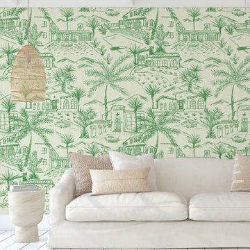 Paperweave paper weave printed modern toile design featuring a 2 color print with Spanish style houses, variety of palm trees and tropical and desert inspired plants, massive pools, vintage cars and fountains with mountains in the background.