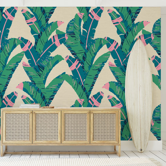 printed grasscloth wallpaper oversized leafs vertical stripe bananas Grasscloth Natural Textured Eco-Friendly Non-toxic High-quality Sustainable practices Sustainability Interior Design Wall covering Bold Wallpaper Custom Tailor-made Retro chic Tropical jungle garden botanical vacation beach kid palm tree leaf oversized green cream neon pink living room entrance foyer surf surf shack