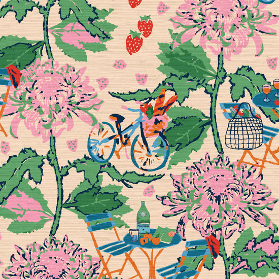 Printed grasscloth wallpaper inspired by the french market, off white base with linear pink florals arranged in vertical stripes.  filled in between are tiny scenes of bicycles with a basket full of market groceries, a bistro set of furniture featuring a bottle of pellegrino and glasses; mixed fruit scattered throughout the print. food fruit bistro chair table