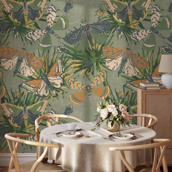 Grasscloth printed wallpaper with allover butterflies, palm leaves and mini insects overlapped in an oversized print.Grasscloth wallpaper Natural Textured Eco-Friendly Non-toxic High-quality Sustainable Interior Design Bold Custom Tailor-made Retro chic Bold tropical butterfly bug palm leaves animals botanical garden nature kids playroom bedroom nursery green moss jungle olive kitchen dining room