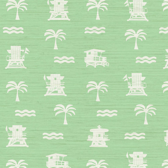 light green (mint) base grasscloth wallpaper with white print of lifeguard stands, waves and palm trees in a mini icon print