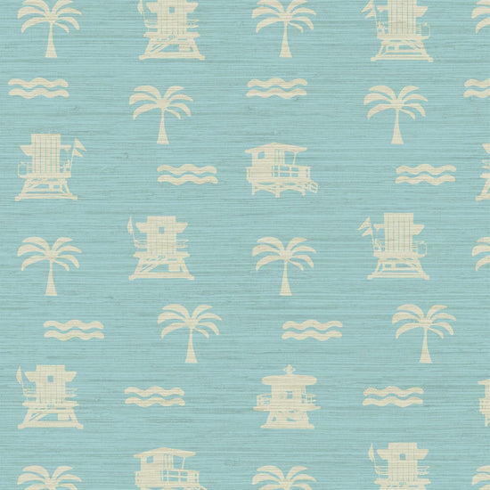 blue base grasscloth wallpaper with white print of lifeguard stands, waves and palm trees in a mini icon print