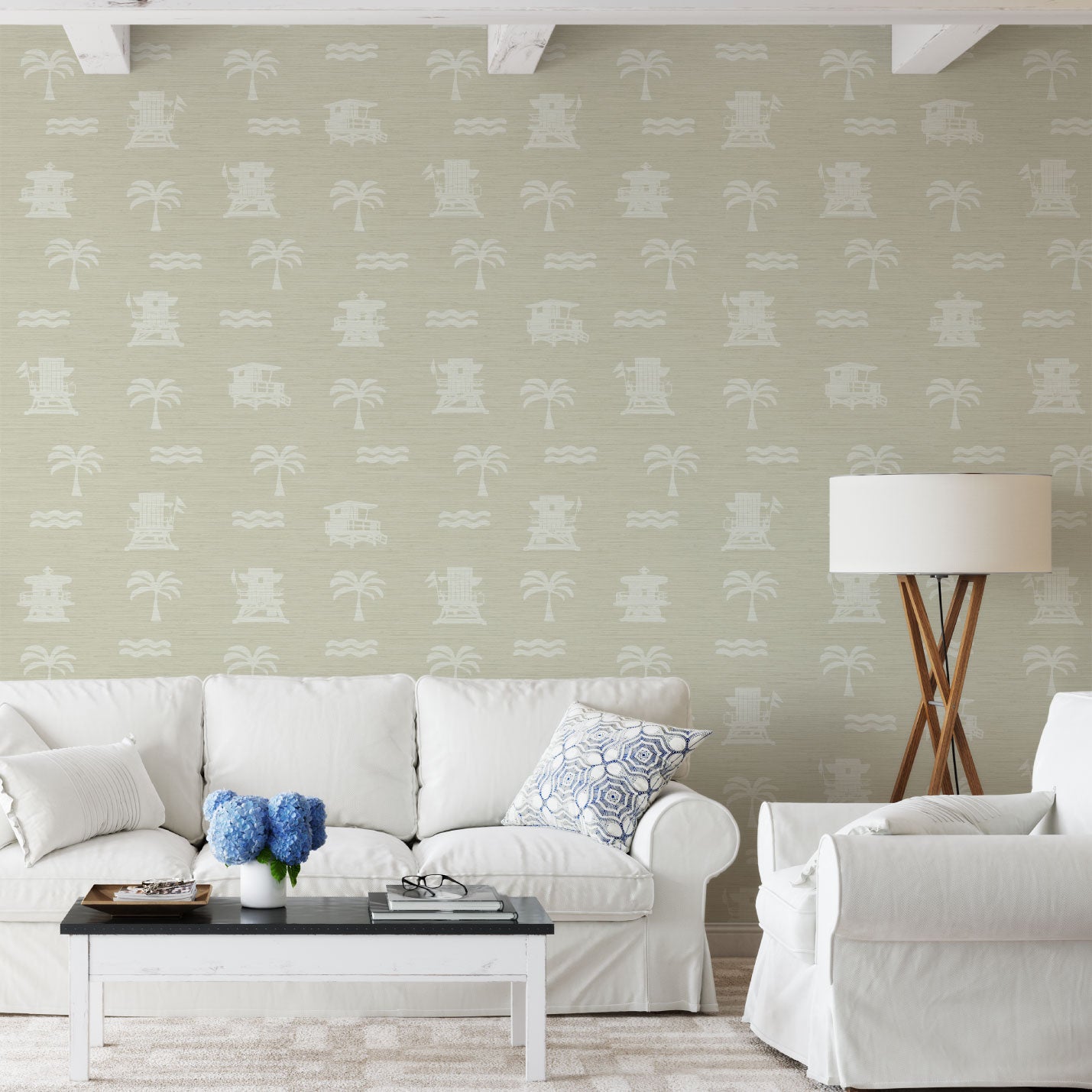 Living Room with tan base grasscloth wallpaper with white print of lifeguard stands, waves and palm trees in a mini icon print