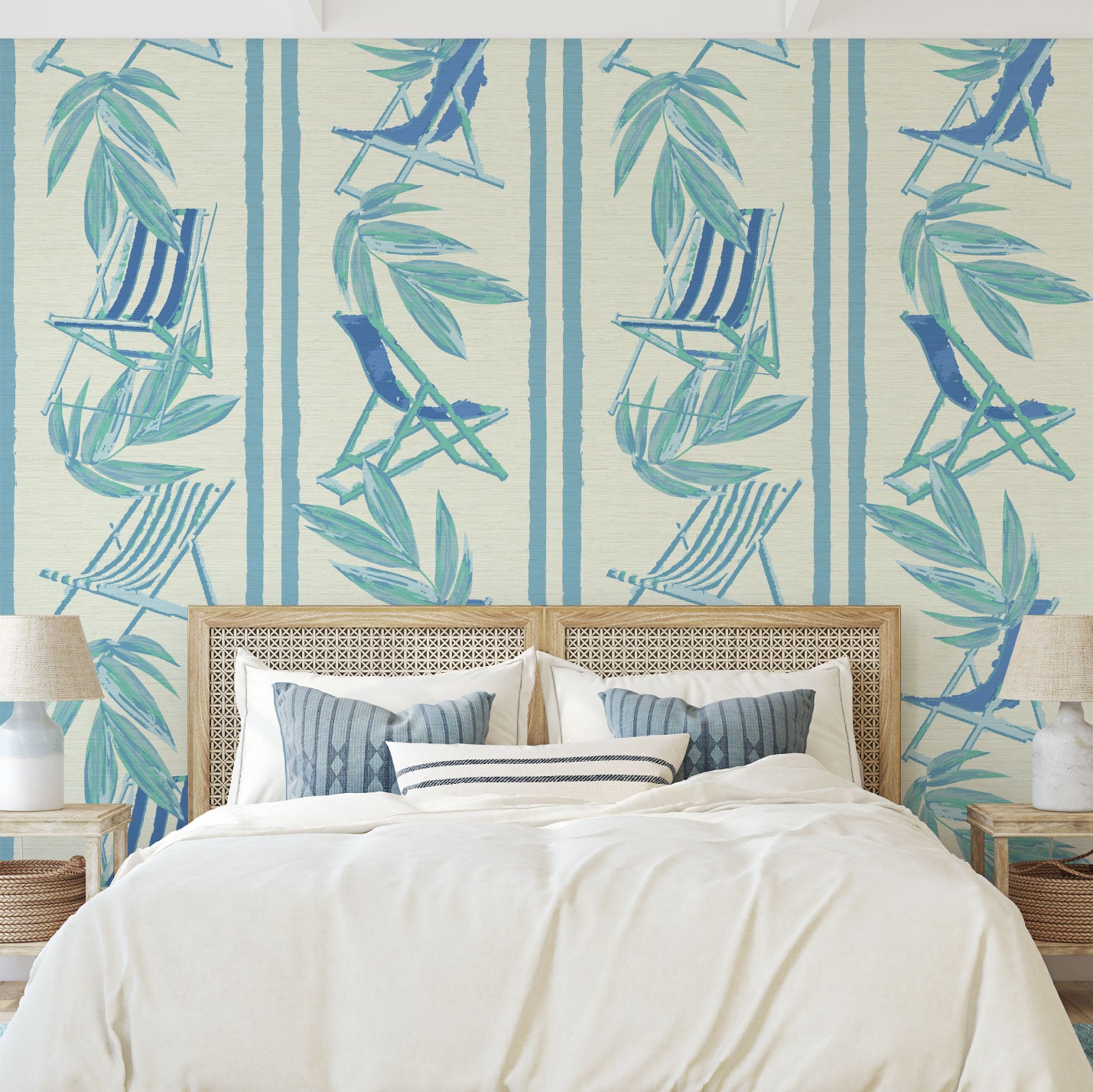 vertical linear grasscloth wallpaper print with a beachy design of blue leaves and stripes paired with shades of blue beach chairs arranged in a vertical oversized stripe Grasscloth Natural Textured Eco-Friendly Non-toxic High-quality Sustainable practices Sustainability Interior Design Wall covering bold Seaside Coastal Seashore Waterfront Vacation home styling Retreat Relaxed beach vibes Beach cottage Shoreline Oceanfront Nautical bedroom