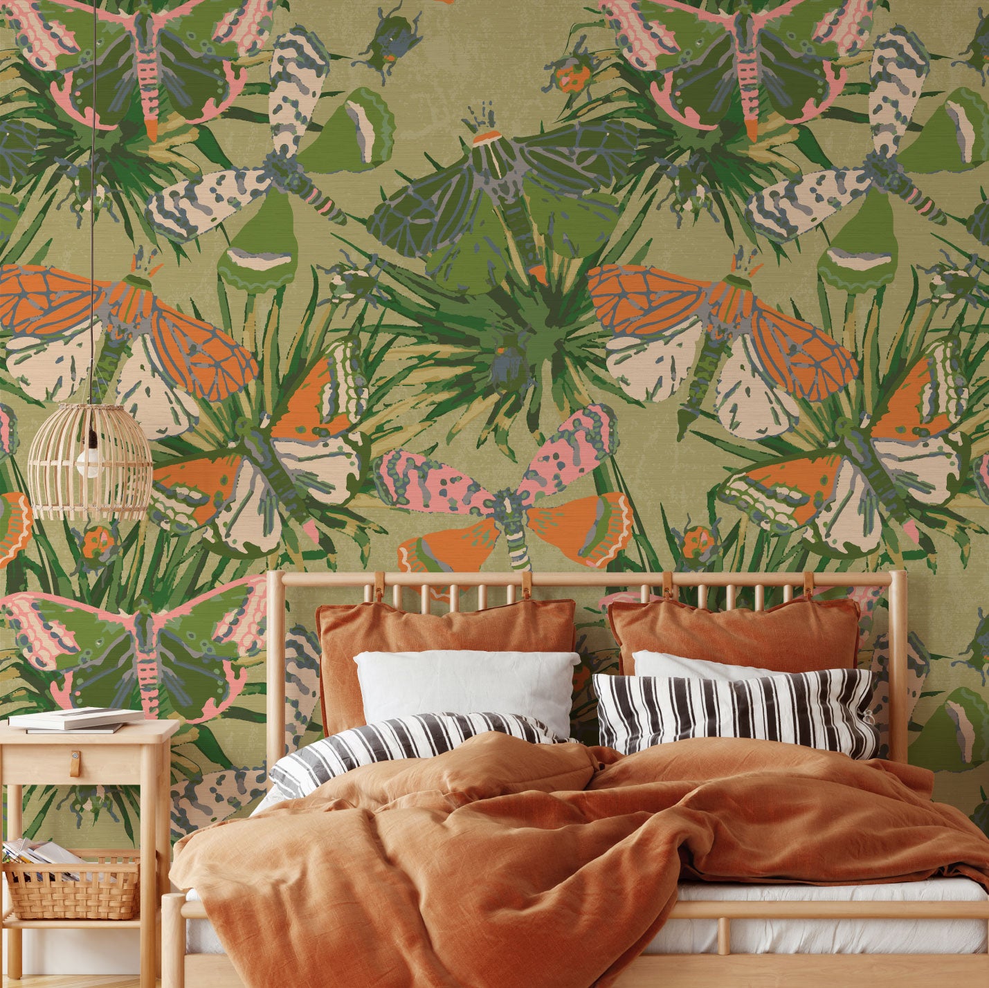 Grasscloth printed wallpaper with dusty olive green base and subtle tonal palm prints in shades of green as base print with oversized multi colored butterflies layered on top in oversized scale. Butterflies are designed using a range of dusty pink, orange, turquoise, royal blue and cream