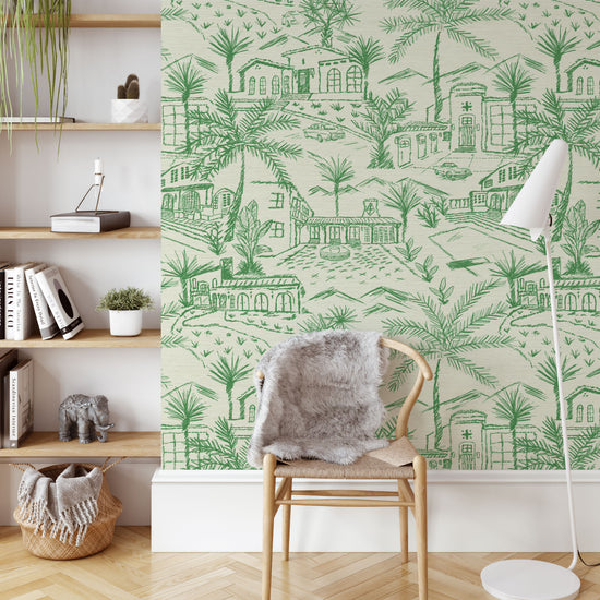 Grasscloth printed modern toile design featuring a 2 color print with Spanish style houses, variety of palm trees and tropical and desert inspired plants, massive pools, vintage cars and fountains with mountains in the background.