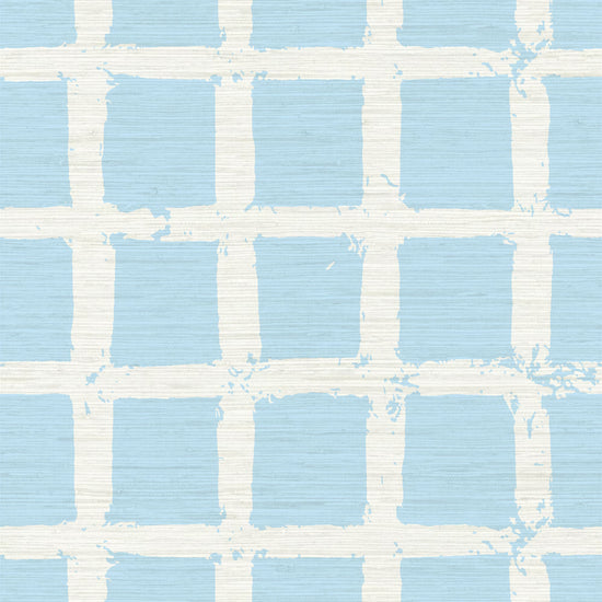 Grasscloth wallpaper in hand painted square pattern emulating window panes in an oversized plaid layout with a french blue base on cream print