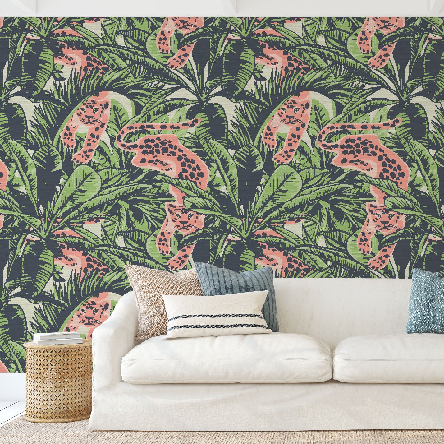 Load image into Gallery viewer, Living room with grasscloth printed wallpaper on off white base with allover palm prints in a variety of leaf shapes and variatals. Print includes neon cheetah in a paper cutout artwork aesthetic creeping through the palm leafs and locking eyes with the viewer.
